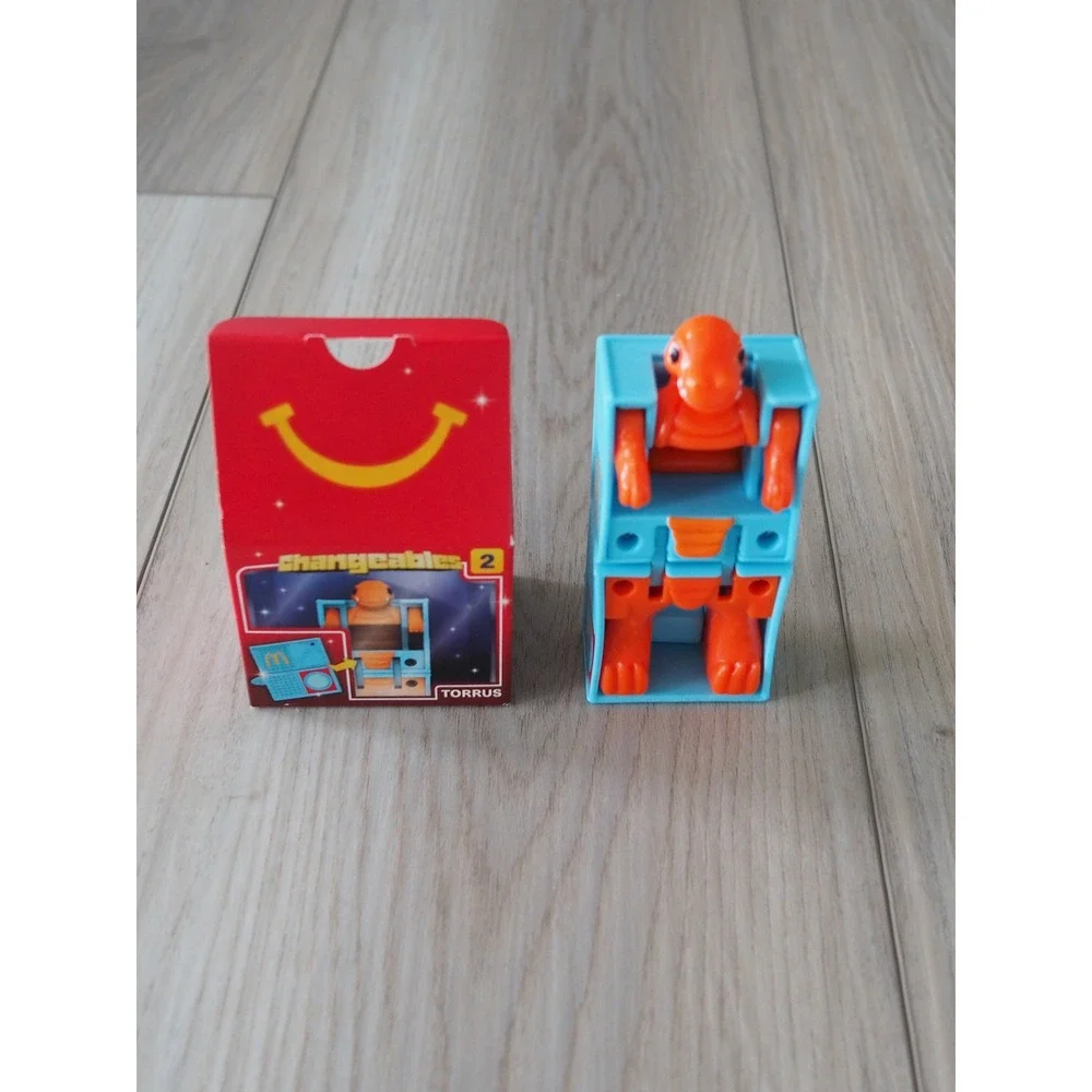 New McDonalds Changeables 2 Torrus Orange Blue Happy Meal Toy Robot Dinosaur